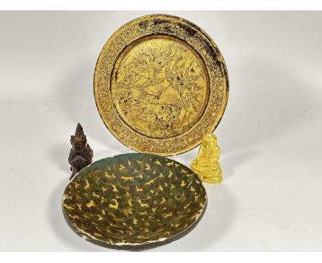 A 19thc Indio Persian Papier-mâché serving bowl with hunting scene depicting gazelle lions, tiger, boar etc on black ground w