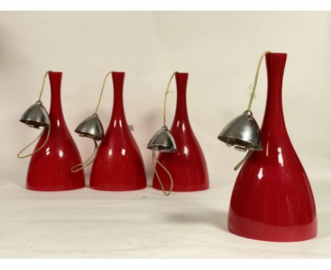 A set of four mid century / vintage red glass pendent light fittings, in the manner of Holmegaard. H39cm.&nbsp;