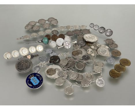 A collection of 19thc and later silver and white metal coin set jewelry to include, brooches, pendants, bracelets, bar brooch