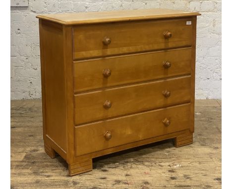 A vintage yellow cedar and plywood chest, fitted with four drawers and raised on block supports. H87cm, W90cm, D42cm.&nbsp;