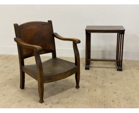 A vintage stained wood nest of three tables, together with a 1930's oak elbow chair (2)&nbsp;