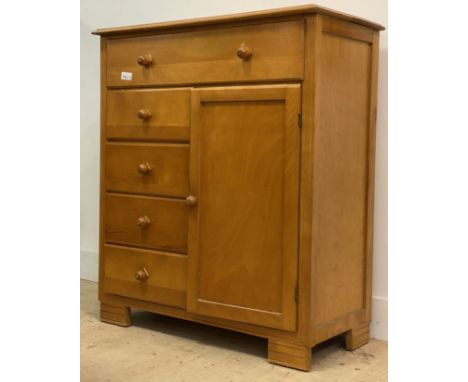 A vintage yellow cedar and plywood side cabinet, fitted with one long and four short drawer, and a cupboard, raised on block 