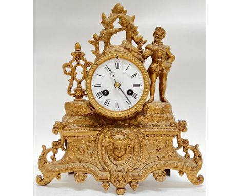 A nineteenth century gilt metal Baroque style French mantle clock with drum movement/bell striking with enamel dial and Roman