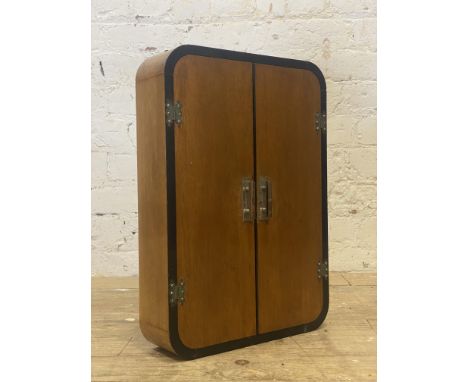 An early 20th century oak wall hanging bathroom cabinet in the Art Deco style, two doors with chrome handles opening to a pla