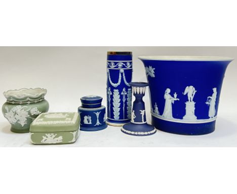 A group of Wedgwood Jasperware comprising a large planter with classical style sprigged decoration against a mid-blue ground 