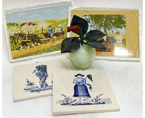 A mixed lot comprising several decorative tiles variously decorated with Delft style and rural scenes, together with a celado