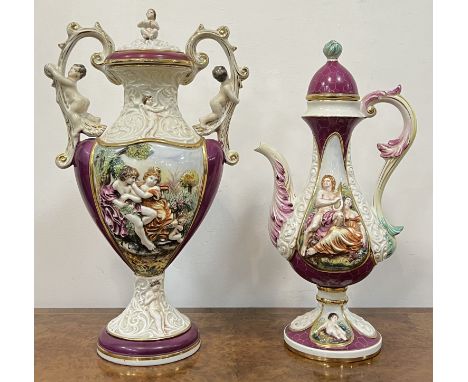 A colossal Keramos R Capodimonte covered vase decorated with classical scenes in gilt low-moulded relief, against a pink grou