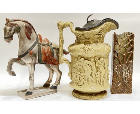 A n early Victorian Charlie Meigh sleigh topped stoneware and pewter tankard-pitcher decorated with Bacchanalian scenes (mark