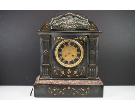 Victorian black slate mantle clock of architectural form, with brass dial, the case with inlaid foliate decoration, brass pla