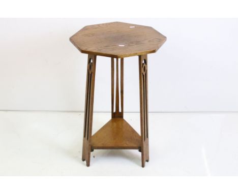 Early 20th century Art Nouveau / Arts &amp; Crafts Oak Side Table in the manner of Liberty of London, the octagonal top raise