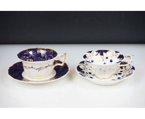 Two 19th century Rockingham porcelain teacups &amp; saucers to include an example decorated with cobalt blue and gilt trailin