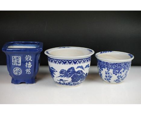 Three Chinese blue &amp; white planters to include a square-form blue ground example with floral decoration and character mar