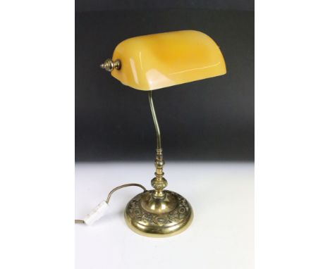 A brass desk / bankers lamp with amber glass shade. 