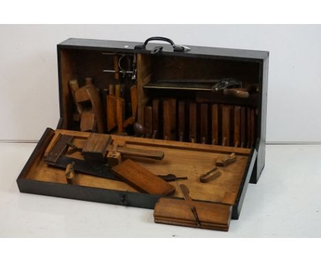 Antique Wooden Woodworking Tool Cabinet, the drop down front opening to a fitted interior with a selection of carpenters tool