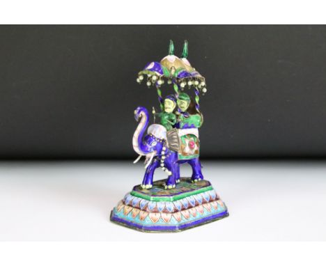 An Indian white metal and enamel ornamental elephant with seed pearl decoration, stands approx 13cm in height. 
