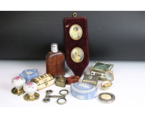 A box of mixed collectables to include folding skeletal opera glasses, leather cased hip flask, ceramic door knobs, Wedgwood 