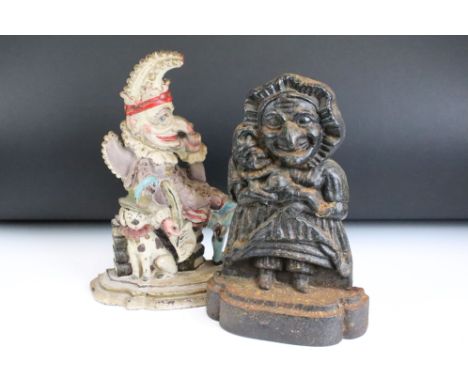 Two Punch &amp; Judy cast iron door stops to include a painted example. 