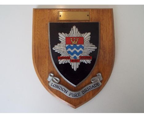 London Fire Brigade - a vintage crested wall plaque mounted on wooden shield, 17.5 cm (h)