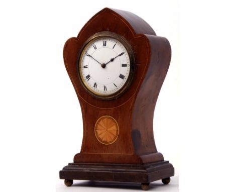 Mid-20th century mahogany and boxwood line inlaid timepiece, the shaped and waisted case raised on four ball feet to a cast b