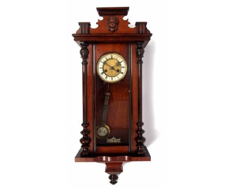 Late 19th/early 20th century Vienna type wall clock with detachable pediment with classical mask, ring turned half columns an