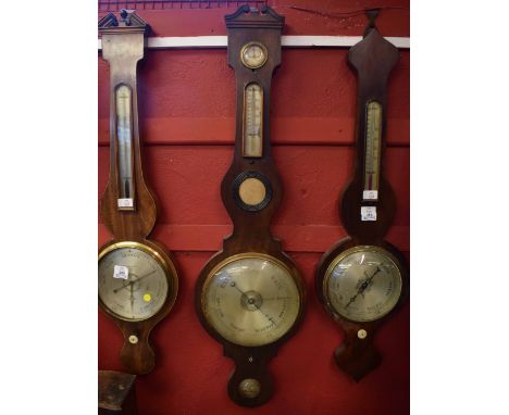 Mid-19th century mahogany cased wheel barometer with swan necked pediment over a silvered hygrometer to a detachable single s