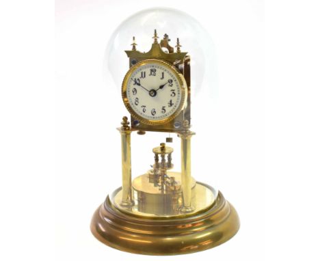 First half of 20th century German brass year going timepiece, 62072, the stepped circular base to two cylindrical supports to