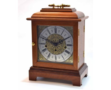 Modern German triple spring driven mantel clock, the case with overhanging cornice and cushion moulded pediment with carry ha