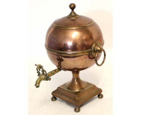 Victorian copper and brass samovar with two ringlet handles either side with finial top with a brass tap with ivory detail, r