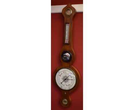 Late 19th century walnut wheel barometer, signed J C Heald - Optician, Wisbech, the onion top case fitted with a silvered hyg