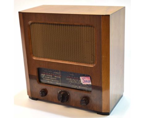 Mixed Lot: comprising a wooden cased radio, a Pilot radio of rectangular form with central glazed dial and speaker cover with