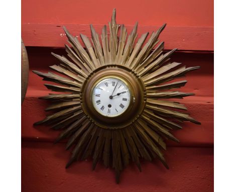Mid-20th century gilt cased "Sunburst" wall timepiece, the gilt finished sunburst case with raised centre to a cast brass bez