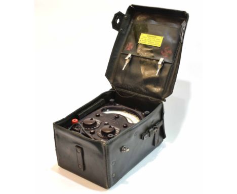Mid-20th century portable cased voltmeter, Universal Avometer, the stitched case with top carry handle and rectangular unit w