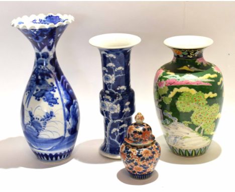 Group of Oriental porcelain items comprising a baluster vase with polychrome decoration and two blue and white vases, one wit