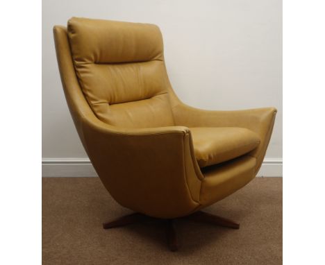 1970's Parker Knoll 'statesman' style vintage retro swivel armchair on teak five point, upholstered in mustard faux leather