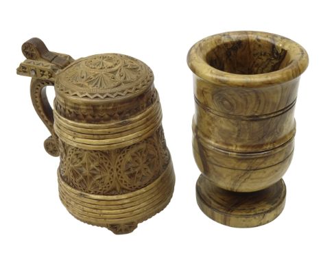 20th century Norwegian Peg Tankard, tapering staved body and lid carved with geometric roundels, scroll hinged handle and thr