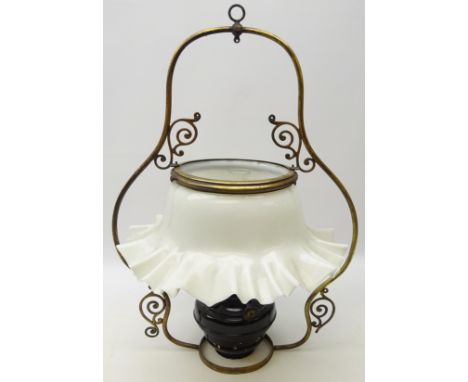 Early 20th century brass framed hanging oil lamp with Japanned well and opaque frilled edged shade, H70cm  
