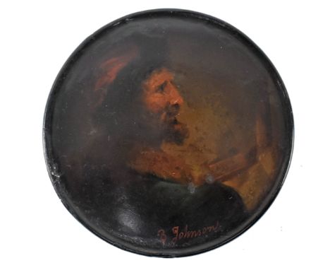 An early 19th century papier mache lacquered snuff box. The circular lidded snuff painted with portrait of a man by B. Johnso