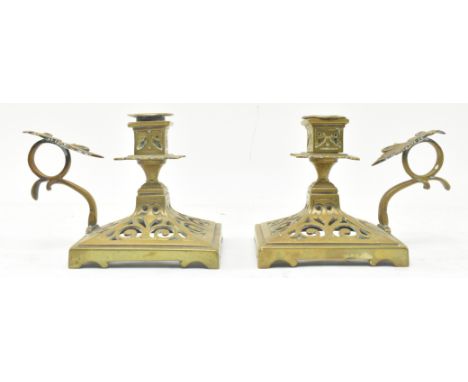 A pair of 19th century believed French gothic style brass pierced night lights / candlestick chambersticks. Each night light 