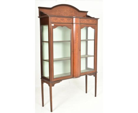 An Edwardian mahogany &amp; satinwood inlaid display vitrine bookcase cabinet on legs. The cabinet having a shaped gallery ba