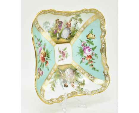 An early 19th century continental hand painted porcelain squared platter. The platter with gilt scrolled border having four v