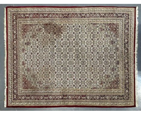 A large 20th century vintage Persian Islamic Moud floor carpet rug. The rug in beige and red colourways with central panel de