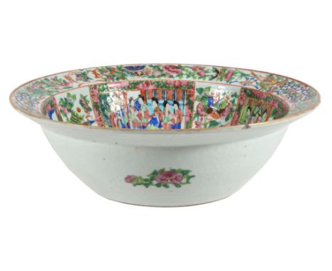 A large Cantonese basin, circa 1860, typically painted with panels of figures  A large Cantonese basin, circa 1860,   typical