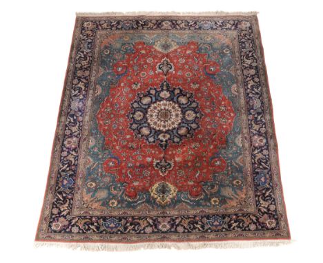 A Tabriz carpet, approximately 340cm x 253cm  A Tabriz carpet,   approximately  340cm x 253cm 