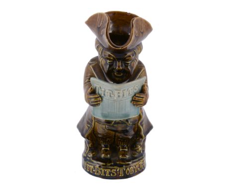 A Staffordshire 'Tit-Bits Toby Jug' , first quarter 20th century  A Staffordshire (Ault Pottery) 'Tit-Bits Toby Jug'  , first