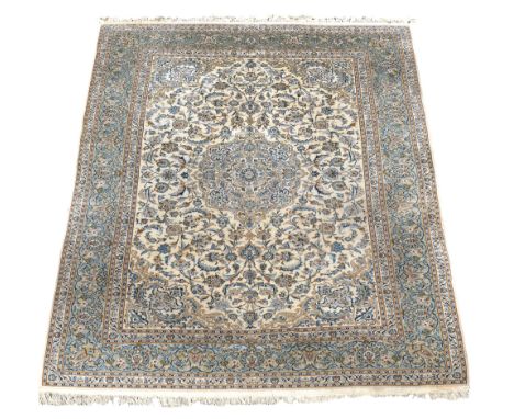 A large Persian carpet with floral border and floral field 350cm x 250cm  A large Persian carpet with floral border and flora