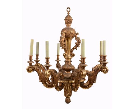 A carved and giltwood eight light chandelier in mid 18th century Italian taste  A carved and giltwood eight light chandelier 