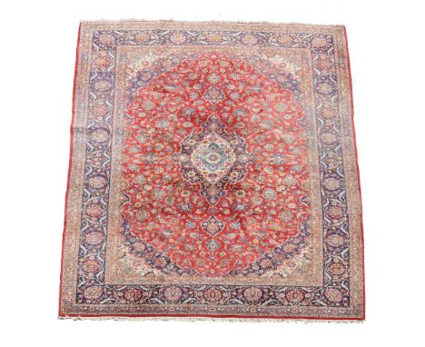 A Kashan carpet 258cm x 447cm Please note: the measurement is incorrect and should read as follows, approximately 257 x 344cm