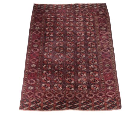 A Tekke carpet, approximately 363cm x 225cm  A Tekke carpet,   approximately    363cm x 225cm 