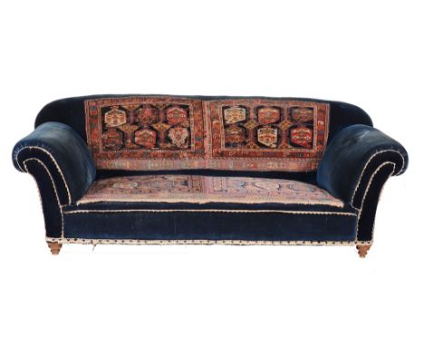 A velvet and carpet panel upholstered sofa, early 20th century  A velvet and carpet panel upholstered sofa,   early 20th cent