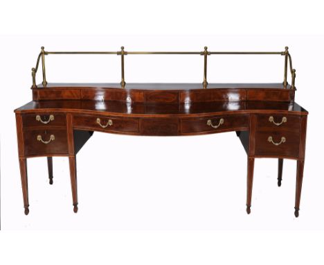 A George III mahogany serpentine sideboard, circa 1800, with string inlay  A George III mahogany serpentine sideboard,   circ